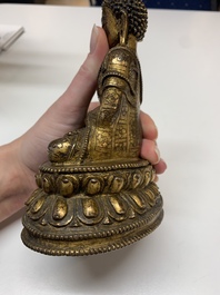 A fine Sino-Tibetan gilt bronze Buddha, 15/16th C.