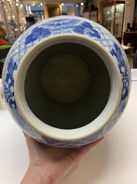 A near pair of Chinese blue and white 'landscape' vases and covers, 19th C.