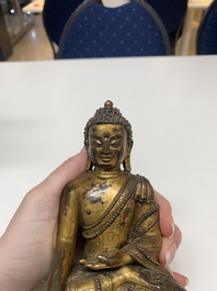 A fine Sino-Tibetan gilt bronze Buddha, 15/16th C.