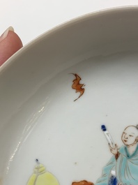 A Chinese famille rose 'ruby back' plate with figural design, 19th C.