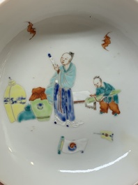 A Chinese famille rose 'ruby back' plate with figural design, 19th C.