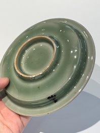 A Chinese Longquan celadon 'twin fish' plate, Yuan/Ming