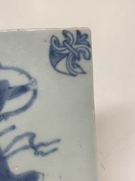 A Chinese blue and white 'archer' tile after a Dutch Delft example, Transitional period