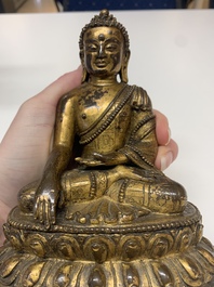 A fine Sino-Tibetan gilt bronze Buddha, 15/16th C.