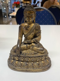 A fine Sino-Tibetan gilt bronze Buddha, 15/16th C.