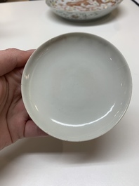 Two famille rose 'dragon' bowls and covers and a plate, Qianlong and Guangxu marks, 19/20th C.