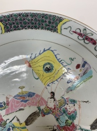 A Chinese famille rose 'horserider' dish, Yongzheng/Qianlong