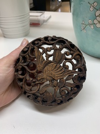 A pair of fine Chinese famille verte turquoise-ground 'magpie and prunus' jars with reticulated wooden covers, 19th C.
