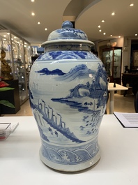 A near pair of Chinese blue and white 'landscape' vases and covers, 19th C.