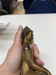 A fine Sino-Tibetan gilt bronze Buddha, 15/16th C.
