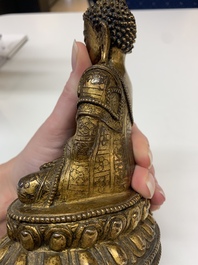 A fine Sino-Tibetan gilt bronze Buddha, 15/16th C.