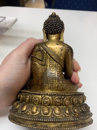 A fine Sino-Tibetan gilt bronze Buddha, 15/16th C.