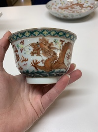 Two famille rose 'dragon' bowls and covers and a plate, Qianlong and Guangxu marks, 19/20th C.