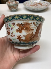 Two famille rose 'dragon' bowls and covers and a plate, Qianlong and Guangxu marks, 19/20th C.