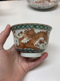 Two famille rose 'dragon' bowls and covers and a plate, Qianlong and Guangxu marks, 19/20th C.
