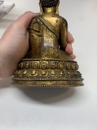 A fine Sino-Tibetan gilt bronze Buddha, 15/16th C.