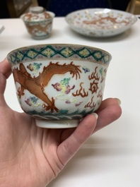 Two famille rose 'dragon' bowls and covers and a plate, Qianlong and Guangxu marks, 19/20th C.