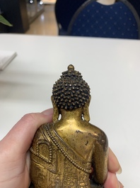 A fine Sino-Tibetan gilt bronze Buddha, 15/16th C.