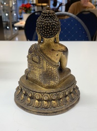 A fine Sino-Tibetan gilt bronze Buddha, 15/16th C.