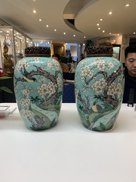 A pair of fine Chinese famille verte turquoise-ground 'magpie and prunus' jars with reticulated wooden covers, 19th C.