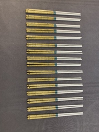 16 pairs of Chinese yellow- and turquoise-enamelled porcelain chopsticks, 20th C.