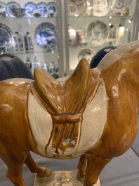 A Chinese sancai-glazed model of a horse, Tang