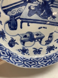 A Chinese blue and white 'erotic scene' plate, Kangxi