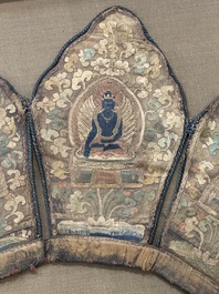 A framed Tibetan silk-embroidered four-leaf ritual crown with Transcendent Buddhas, Tibet, 18th C.