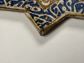 A Kashan lustre-glazed star tile, Persia, 13/14th C.