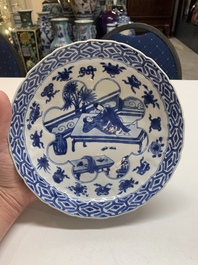 A Chinese blue and white 'erotic scene' plate, Kangxi