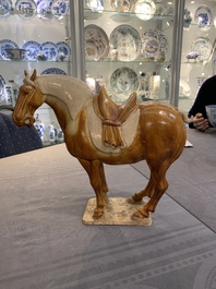 A Chinese sancai-glazed model of a horse, Tang