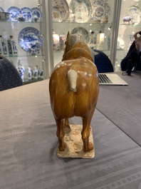 A Chinese sancai-glazed model of a horse, Tang