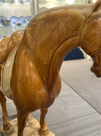 A Chinese sancai-glazed model of a horse, Tang