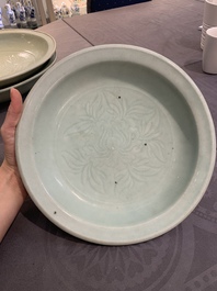 Three Chinese celadon dishes with floral design, Ming and later