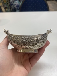 Four silver Kashkul bowls and a rectangular tray, India and Persia, 19/20th C.