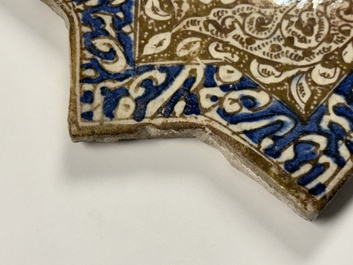 A Kashan lustre-glazed star tile, Persia, 13/14th C.