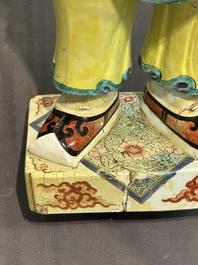 A pair of large Chinese famille rose figures on stands, Qianlong