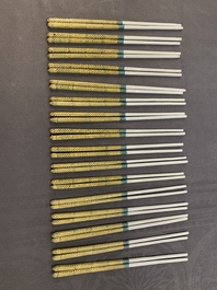 16 pairs of Chinese yellow- and turquoise-enamelled porcelain chopsticks, 20th C.
