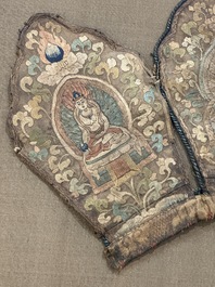 A framed Tibetan silk-embroidered four-leaf ritual crown with Transcendent Buddhas, Tibet, 18th C.