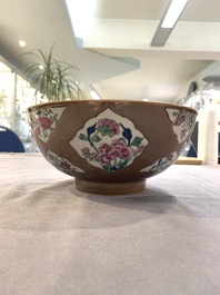 A Chinese famille rose capucin-brown-ground bowl and two plates, Qianlong