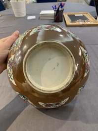 A Chinese famille rose capucin-brown-ground bowl and two plates, Qianlong