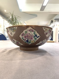 A Chinese famille rose capucin-brown-ground bowl and two plates, Qianlong