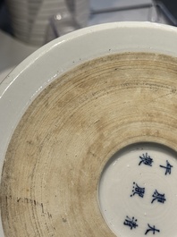 A Chinese blue, white and copper-red 'virtuous officials' brush pot, Kangxi mark, 19/20th C.