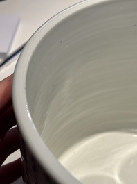 A Chinese blue, white and copper-red 'virtuous officials' brush pot, Kangxi mark, 19/20th C.