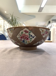 A Chinese famille rose capucin-brown-ground bowl and two plates, Qianlong