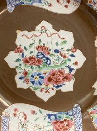 A Chinese famille rose capucin-brown-ground bowl and two plates, Qianlong