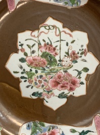 A Chinese famille rose capucin-brown-ground bowl and two plates, Qianlong