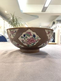 A Chinese famille rose capucin-brown-ground bowl and two plates, Qianlong