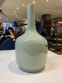 Two Chinese famille verte vases and a blue and white celadon-ground vase, 19th C.