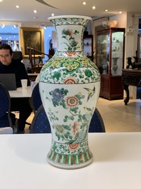 Two Chinese famille verte vases and a blue and white celadon-ground vase, 19th C.